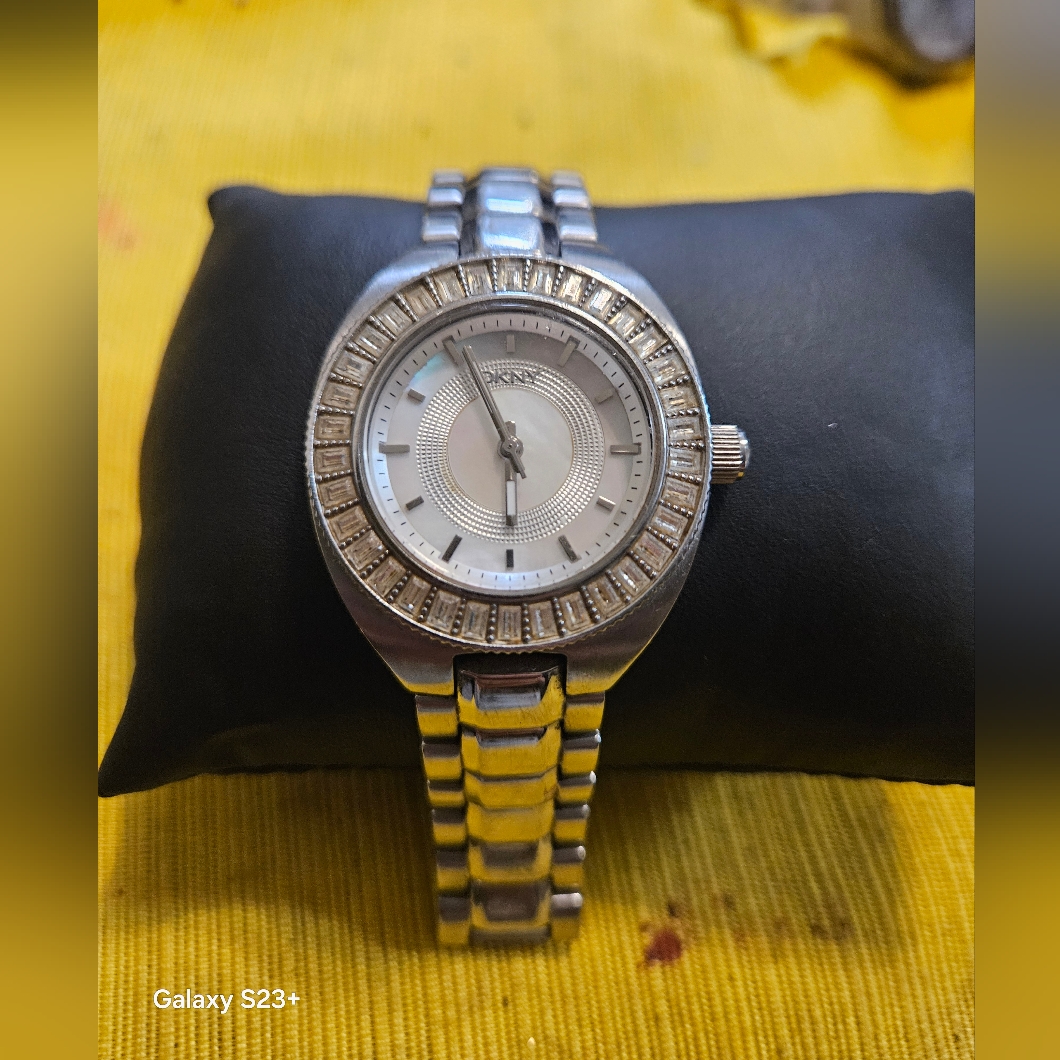 Dkny Silver Watch With Crystal Accents And Mop Dial
